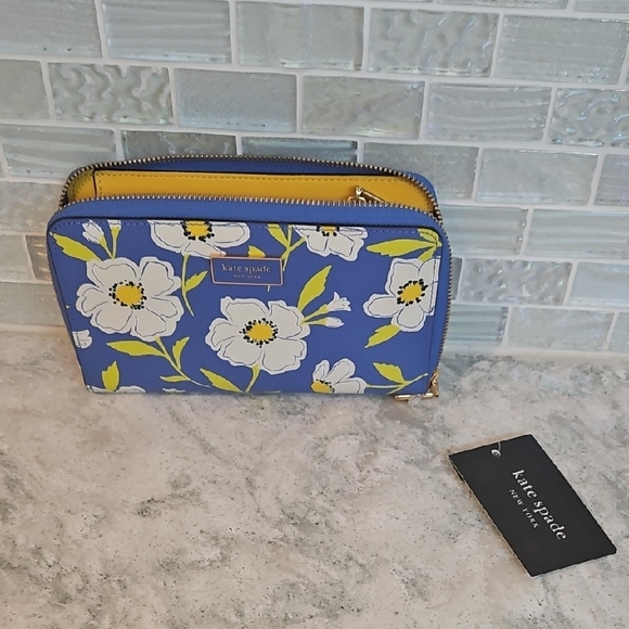 kate spade Handbags - NWT Kate Spade Blue and White Floral Wallet